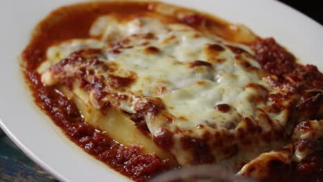 Tight-shot-of-lasagna-on-a-white-plate