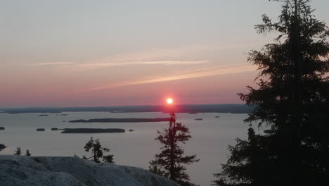 Sunrise-over-Koli-Nationalpark-in-Finland,-Sunrise-in-Stunning-Lake-and-Forest-Landscape