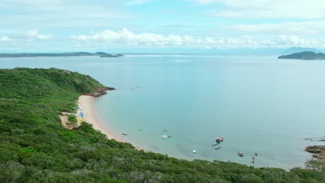 Tartaruga-beach,-The-Brazilian-coast-is-adorned-with-beautiful-sandy-beaches,-stunning-turquoise-waters,-clear-blue-skies,-and-lush-forests