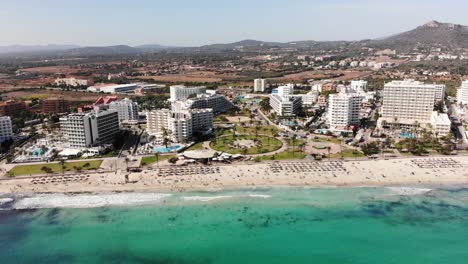 Aerial-View-of-Cala-Millor-Beach-and-Beachfront-Hotels,-Mallorca-Island,-Spain