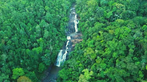 Incredible-green-Brazilian-rainforest-and-waterfall-in-summer,-aerial-4k-shot