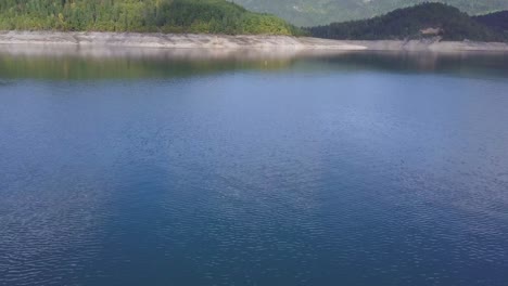 Establishing-4k-shot-of-lake,-hills-and-forest,-Serbia
