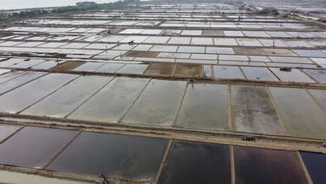 Aerial-view-of-view-of-the-vast-expanse-of-salt-ponds-in-Jepara,-Central-Java,-Indonesia