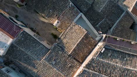 Top-Down-Aerial-view-of-Modica-Alta-Val-di-Noto-Sicily-Old-Baroque-Town-Rooftops-South-Italy
