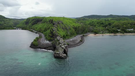 Rocky-peninsula-surrounded-by-sea,-Mauritius-island-coastline