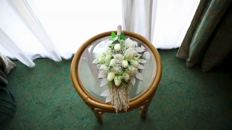 Bride's-bouquet-on-the-table---top-view