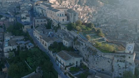 Aerial-view-of-Modica-Alta-Val-di-Noto-Sicily-Old-Baroque-Town-and-Castle-South-Italy-at-Sunrise