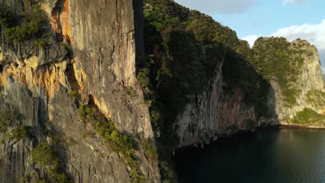 Koh-Yao-Noi-Limestone-Cliffs,-Breathtaking-heights-and-natural-splendor-of-Andaman-Sea's-limestone-cliffs-near-Koh-Yao-Island-with-high-quality-video-footage