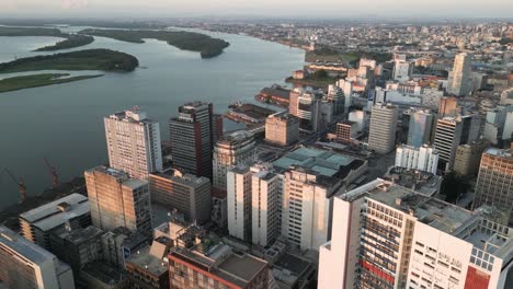 Aerial-over-the-city-of-Porto-Alegre-and-the-Jacui-River,-Brazil