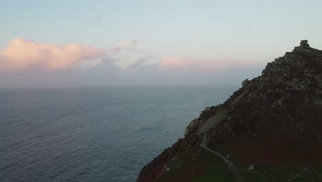 Golden-Hour-Drone-Shot-of-Cliff-Path-and-Sea-in-Exmoor-UK---Aerial-Footage-4K
