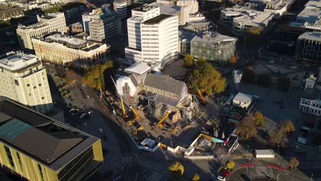 Christchurch-Cathedral,-New-Zealand-is-beeing-repaired-after-earthquake,-historic-building-construction---drone