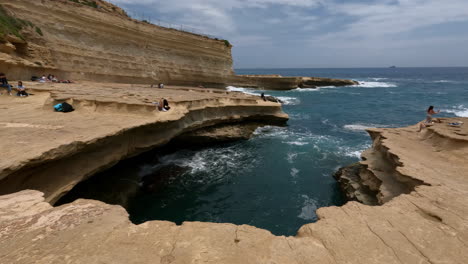 Panoramic-view-of-eroded-limestone-cliffs-in-the-Mediterranean-Sea-in-Malta