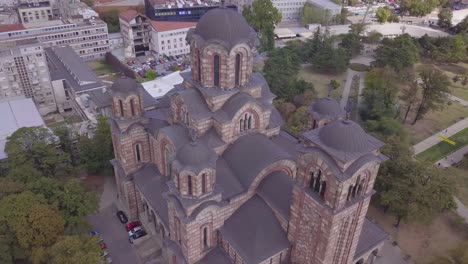 Fast-dramatic-aerial-orbiting-shot-of-St-Mark-Church-in-Belgrade