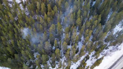 Aerial-of-forest-fire-smoke-directly-above,-Canmore,-Alberta,-Canada