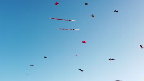 Colorful-Kites-Flying-in-the-Clear-Blue-Summer-Sky-at-Bali-Indonesia