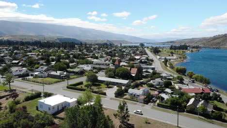 Aerial-view-of-Cromwell,-small-residential-town-in-Central-Otago,-New-Zealand-on-sunny-day,-drone-shot