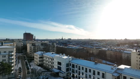 Forward-aerial-of-Ruddammen-and-Vasastan-in-sunny-winter-Stockholm