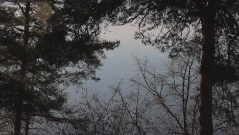 Calmness-Of-Water-During-Sunset-In-Vattern-Lake,-Sweden