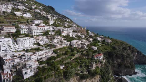 Stunning-seaside-luxury-homes,-villas-found-on-amalfi-coast,-aerial-dolly-italy