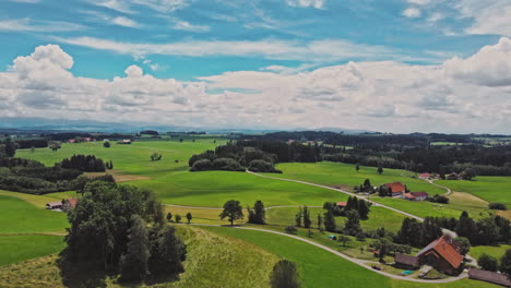 The-beauty-of-Allgäu,-Germany---this-drone-shot-capturing-the-vast-expanse-of-lush,-green-meadows