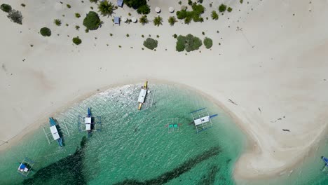 Top-down-perspective-of-banca-outrigger-canoes-in-balabac-islands-of-palawan