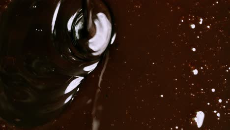 Pouring-chocolate-on-chocolate-from-a-bird's-eye-view