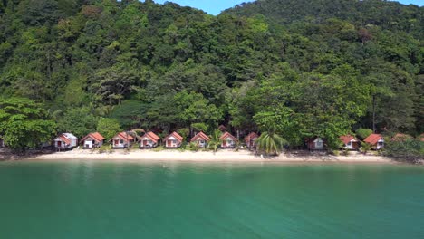 Nice-aerial-view-flight-Cabins-on-jungle-white-sandy-beach-island-koh-chang-thailand-2022