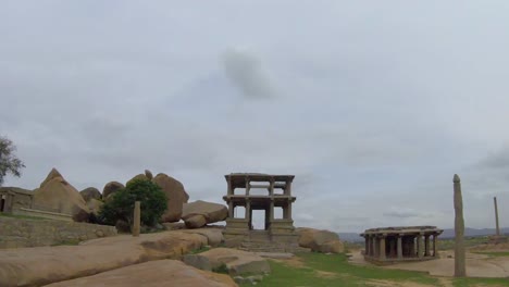 Fantastic-time-lapse-of-rocks-and-old-temple-of-Hampi,-India