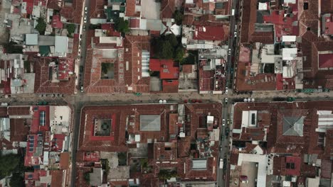 Top-Down-View-Of-Guadalupe-Street,-Famous-Main-Street-Of-San-Cristobal-de-las-Casas-In-Chiapas,-Mexico---drone-shot