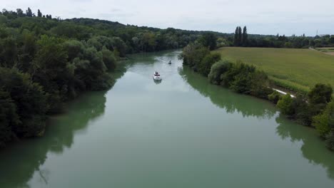 Aerial-shoot-by-drone,-boats-sailing-in-the-river,-France