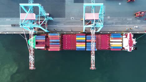 Container-port-cargo-vessel-in-export-import-business-logistics