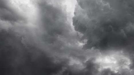 view-of-flying-through-gray-cumulonimbus-clouds-in-the-dark-sky