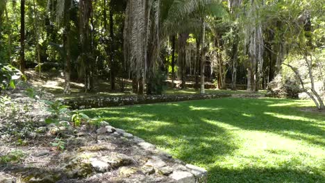 Building-of-the-Eleven-Doors,-view-from-the-end-of-the-Ball-Court-at-Kohunlich-Mayan-Site---Quintana-Roo,-Mexico