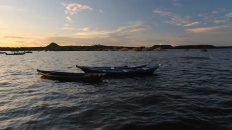 Boats-in-the-Tapajós-River,-Panoramic-Sunset-View-of-Alter-do-Chao,-Pará-Brazil,-Santarém,-Water-Landcape-and-Skyline