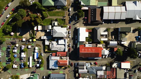 aerial-top-down-of-Tākaka-town-Golden-Bay,-New-Zealand,-drone-scanning-residential-district