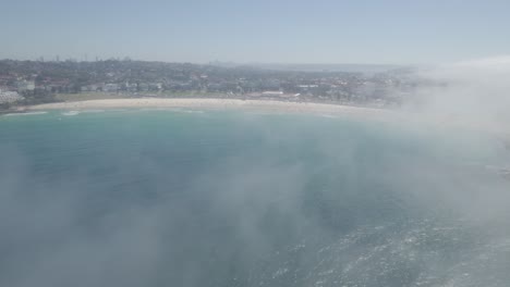 Bondi-Beach-Blanketed-With-Thick-Sea-Fog-On-Midday-In-Eastern-Suburbs,-Sydney,-Australia