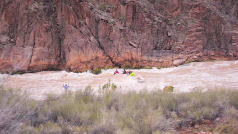 Group-of-people-rafting-down-Colorado-river-in-Grand-Canyon