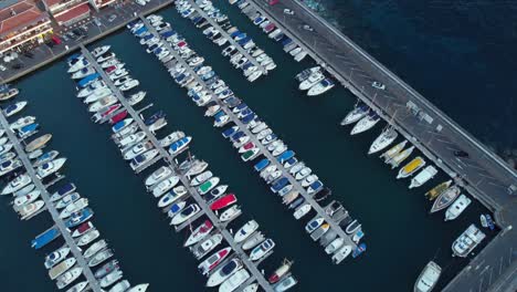 Bird-eye-view-at-formation-of-boats-and-yachts-docked-at-port