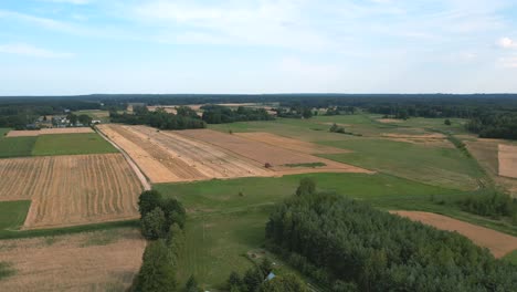 Preparation-for-wintertime---harvest-season-on-Polish,-agricultural-fields