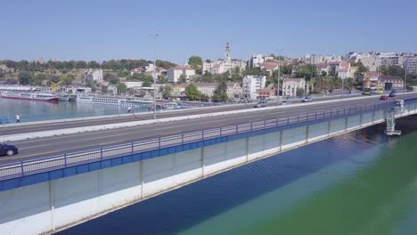 Slow-ascending-aerial-shot-of-Branko-bridge-on-Sava-river-and-Sava-river