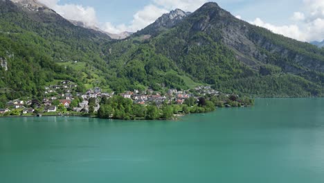 Aerial-view-reveals-Weesen,picturesque-village-nestled-on-shore-of-Walensee