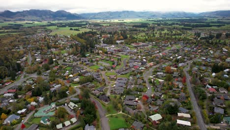 Beautiful-aerial-birds-eye-view-of-Hanmer-Springs-village-and-mountain-scenery-of-New-Zealand
