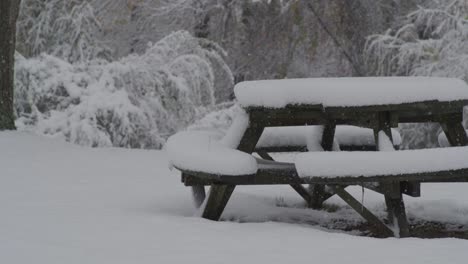 First-Snowfall-on-Picnic-Table---Slow-Motion