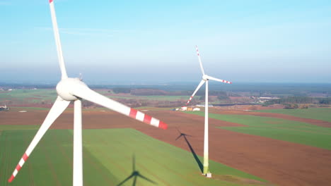 Aerial-beautiful-view-of-wind-turbines-in-wind-farm-generating-green-energy