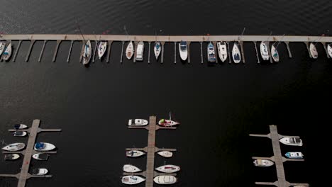 Small-Pleasure-Boats-Anchored-In-The-Yacht-Port-In-Dabie-Lake-In-Szczecin,-Poland