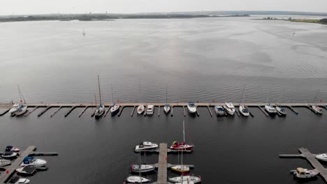 Aerial-View-Of-Sailboats-And-Yachts-Docked-In-The-Marina-In-Szczecin,-Poland