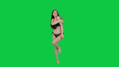 Asombrosa-Modelo-Femenina-Posando-Frente-A-Una-Pantalla-Verde-En-Bikini