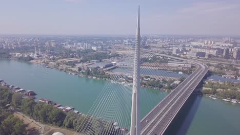 Still-aerial-4k-static-shot-of-Sava-river-and-Ada-bridge-in-Belgrade-city-center