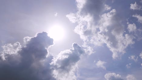 Aerial-circling-looking-at-sun-among-clouds
