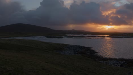 Golden-hour-shot-of-a-winter-sunset-during-a-storm-over-the-island-of-North-Uist